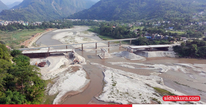 मादीनदी पुलको काम अन्तिम चरणमा