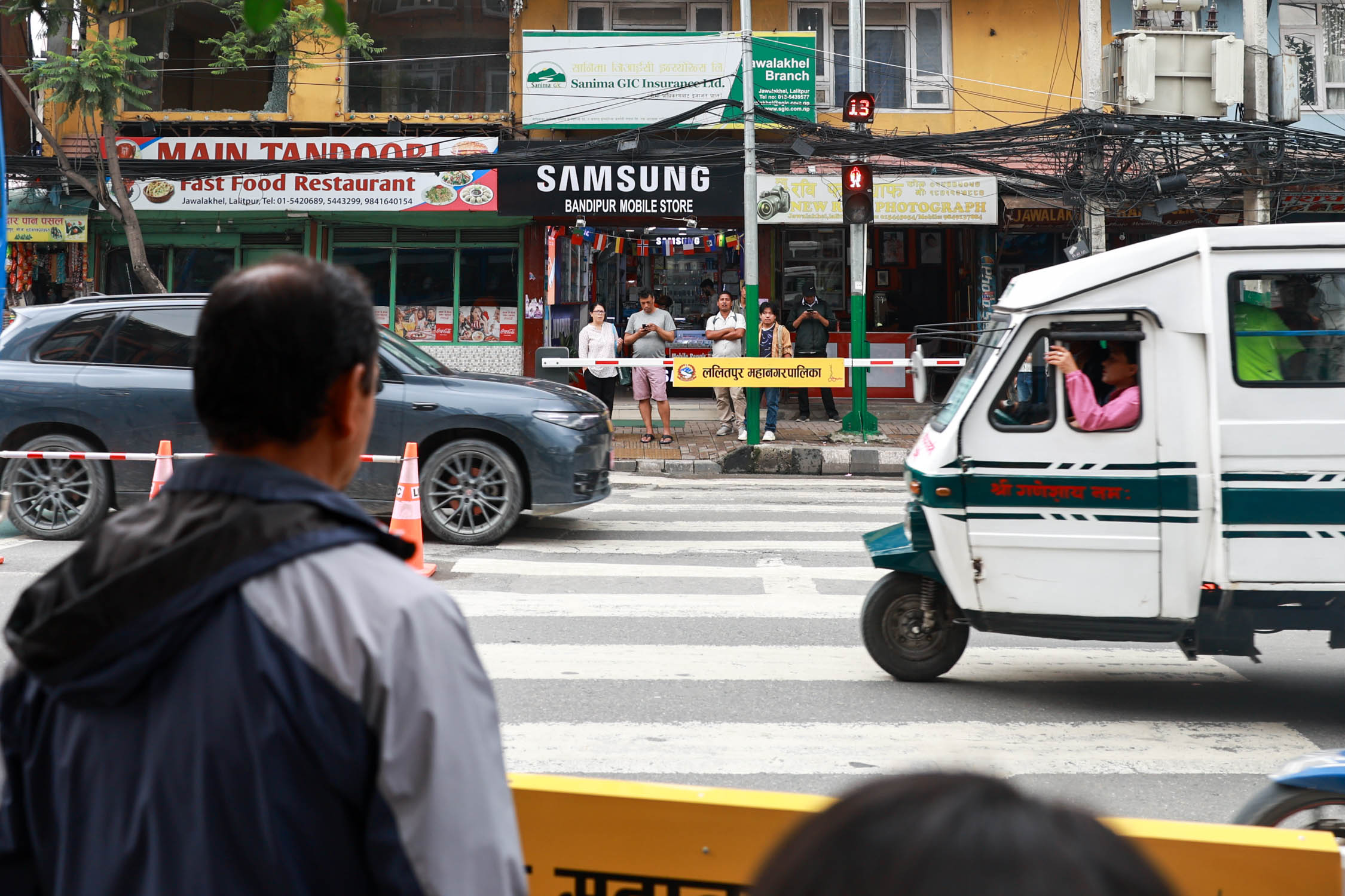 Lalitpur-road-cross-safety-barrier_Nepal-Photo-Library9-1784006857.jpg